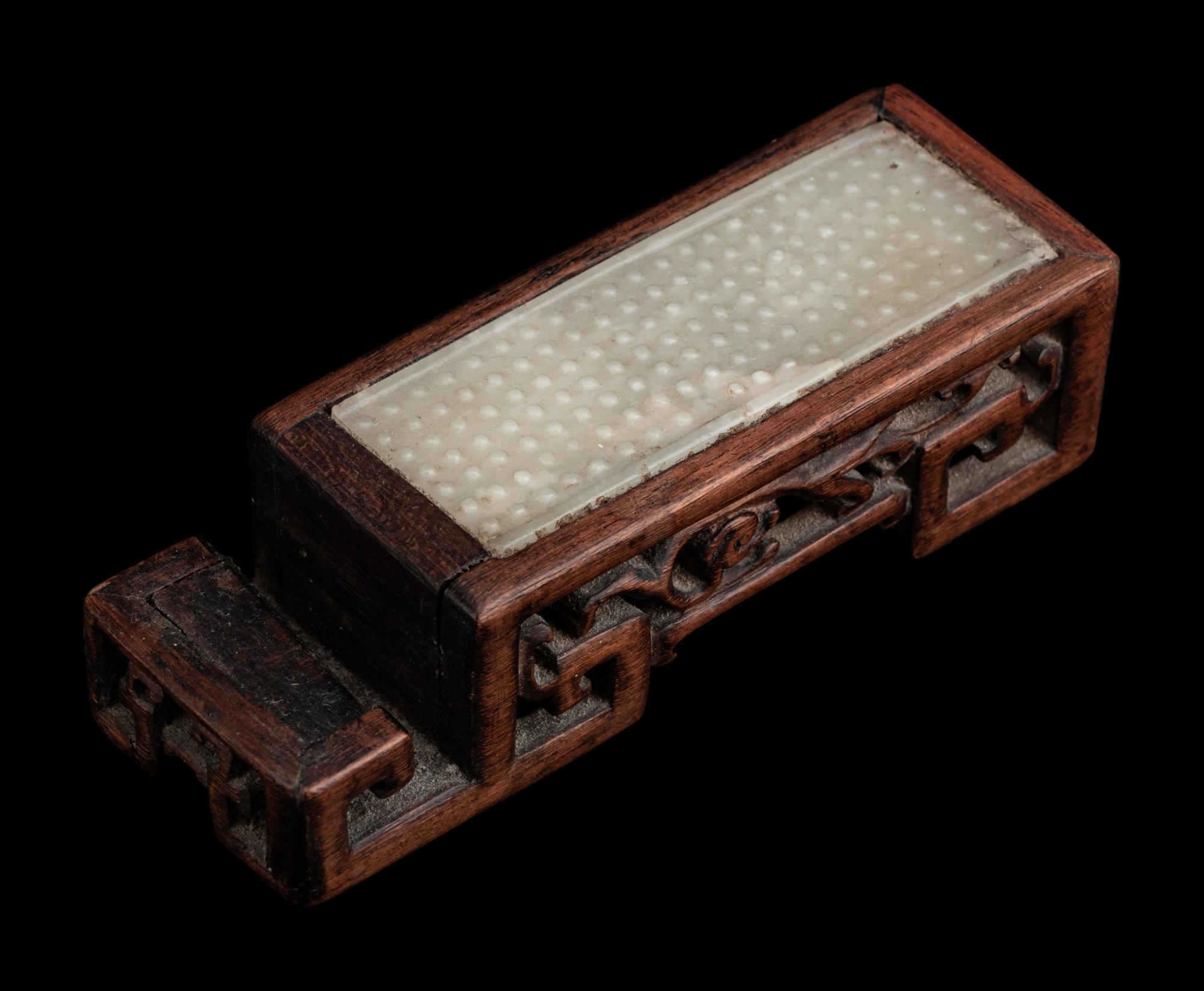 A Chinese Celadon Jade Sword Fitting Mounted as Ink-Cake Stand