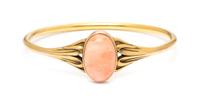 An Art Nouveau Yellow Gold and Coral Bangle, 8.50 dwts.