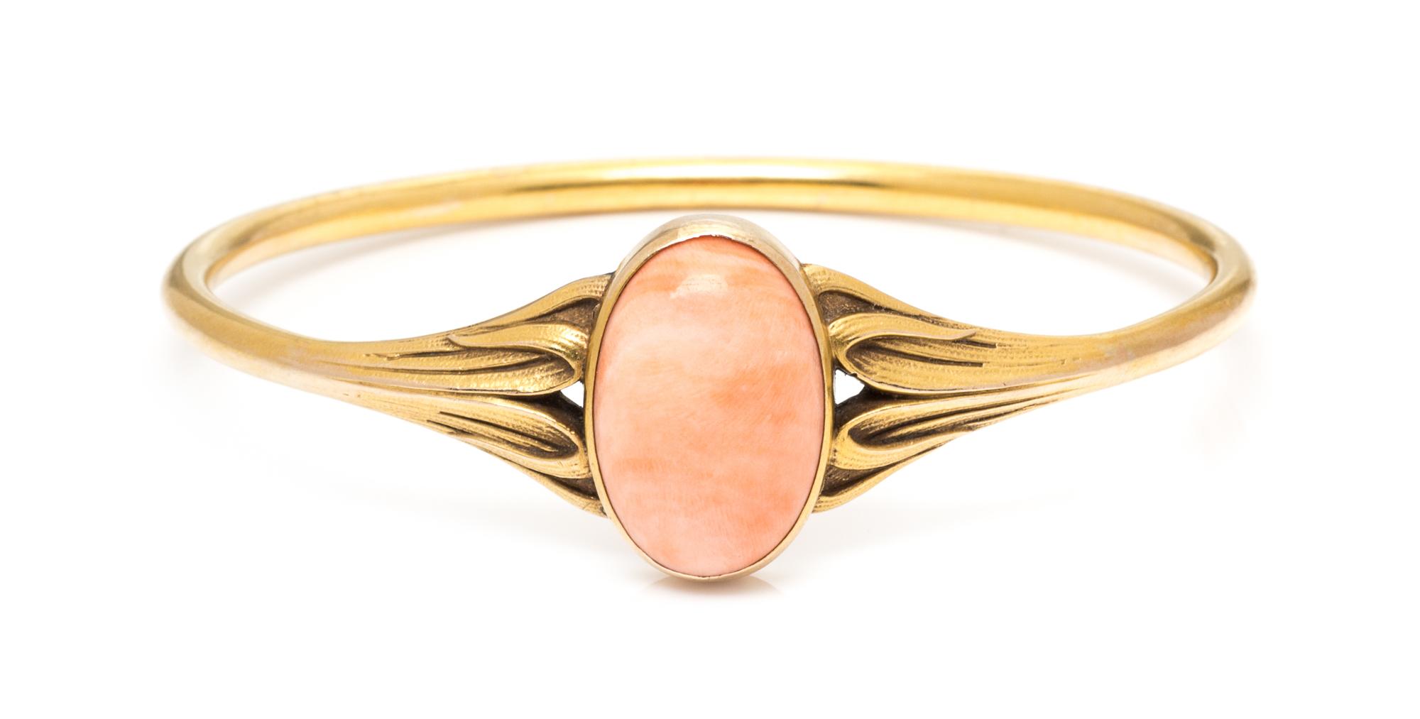 An Art Nouveau Yellow Gold and Coral Bangle, 8.50 dwts.