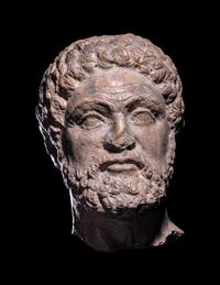 A Greek Terracotta Head of Hercules