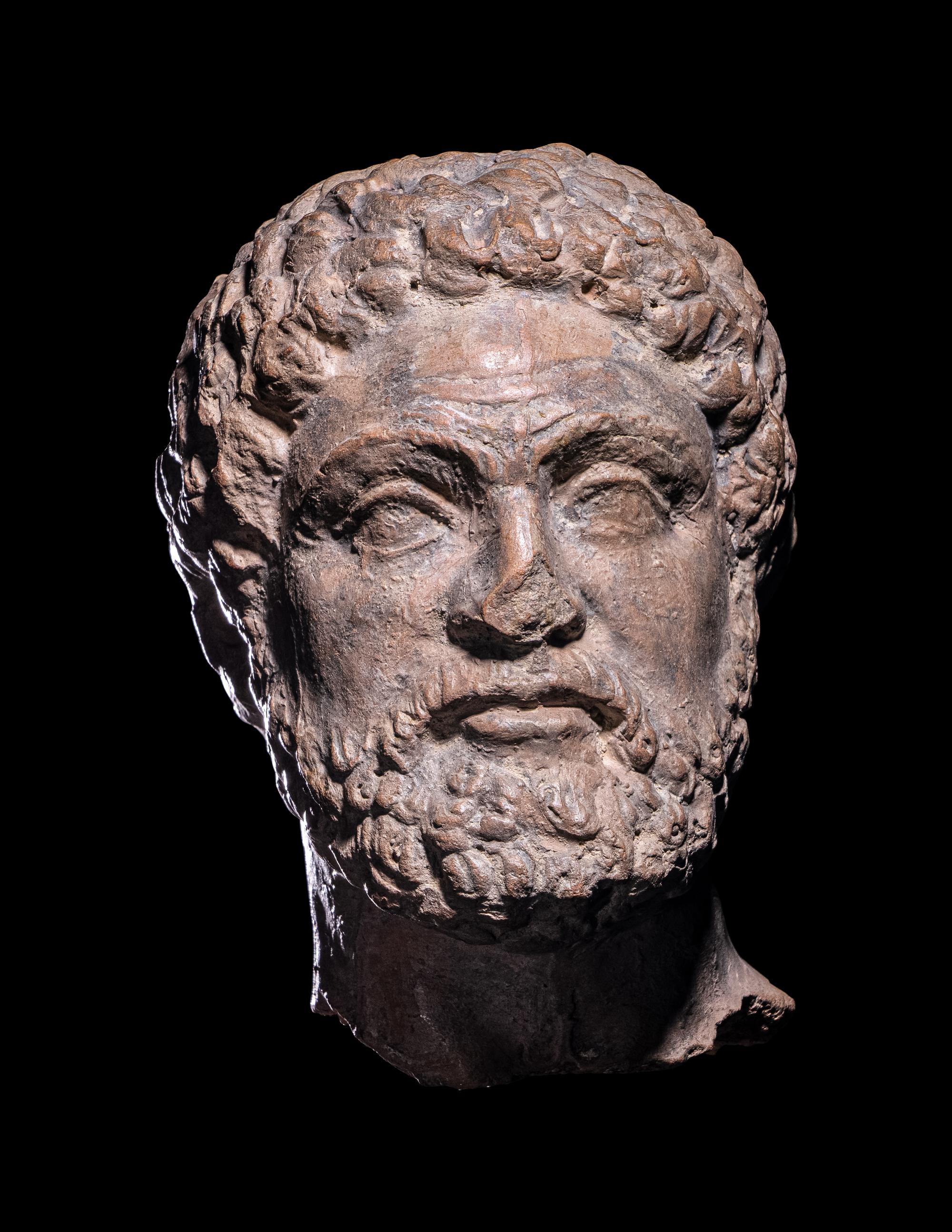 A Greek Terracotta Head of Hercules