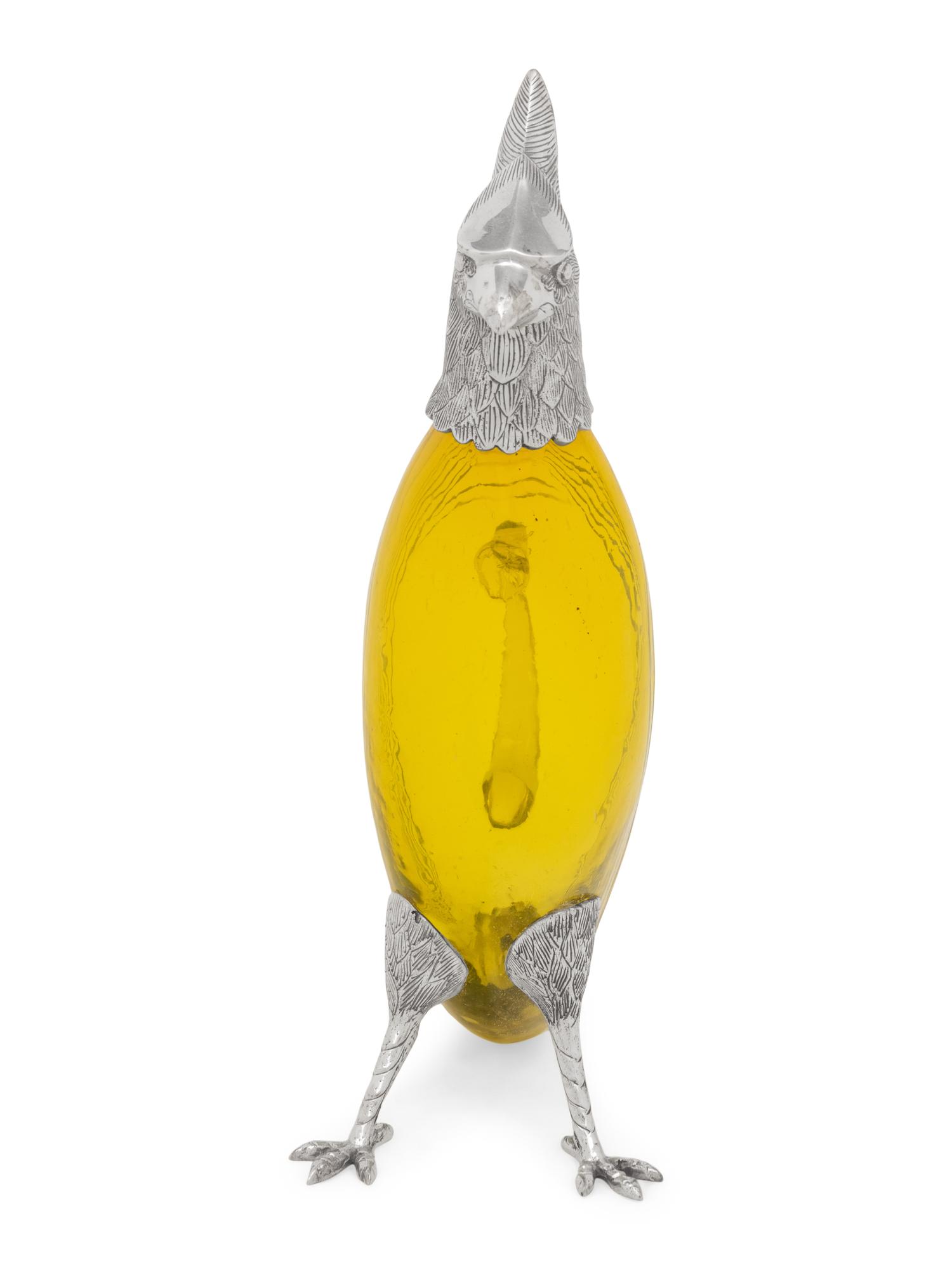 A Silver-Plate and Yellow Glass Bird Decanter