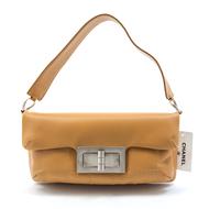 A Chanel Beige Partially Quilted Leather Bag, 11 x 6 x 3 inches.
