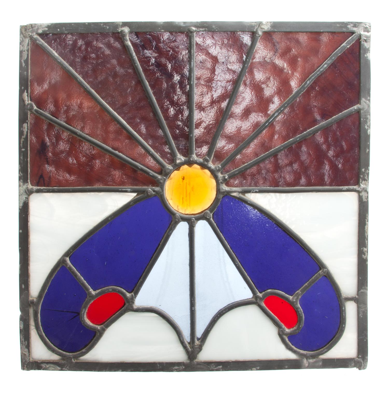 A Collection of Twelve Leaded Glass Windows Largest: 17 1/2 x 39 1/2 inches.