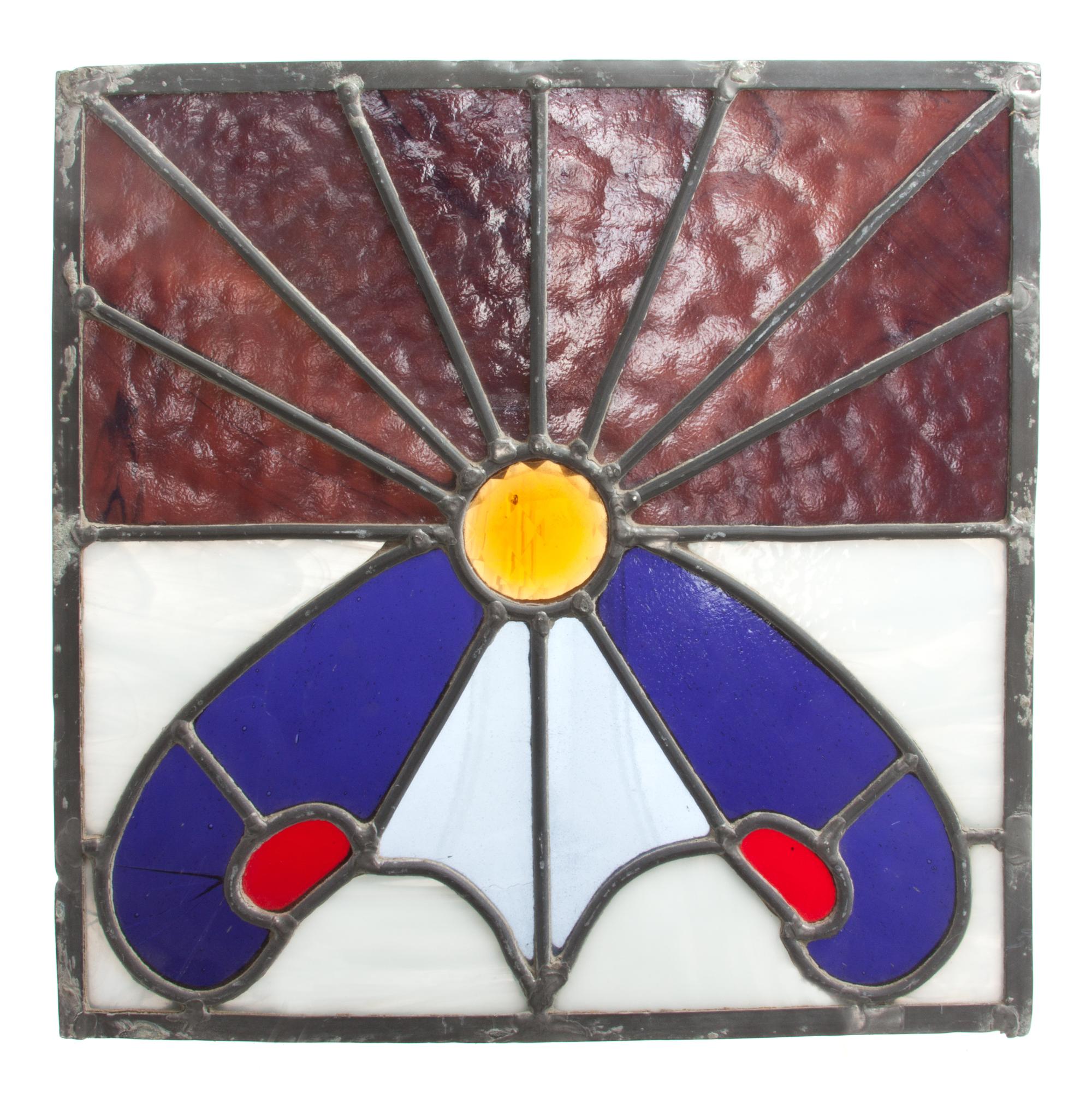A Collection of Twelve Leaded Glass Windows Largest: 17 1/2 x 39 1/2 inches.