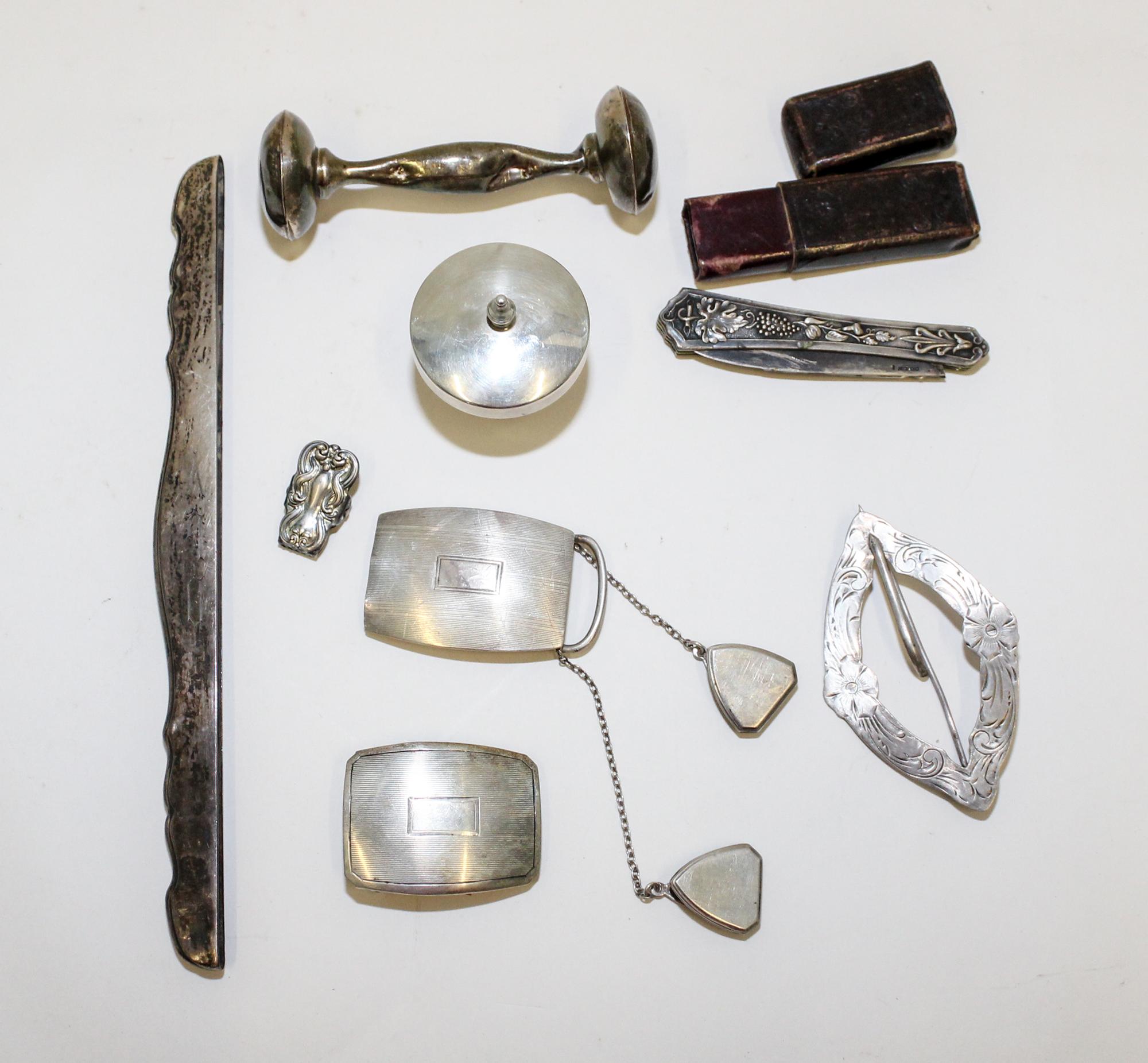 A Collection of American Silver Objects, various makers, comprising an International Sterling two-piece dresser set, two silver belt-bu
