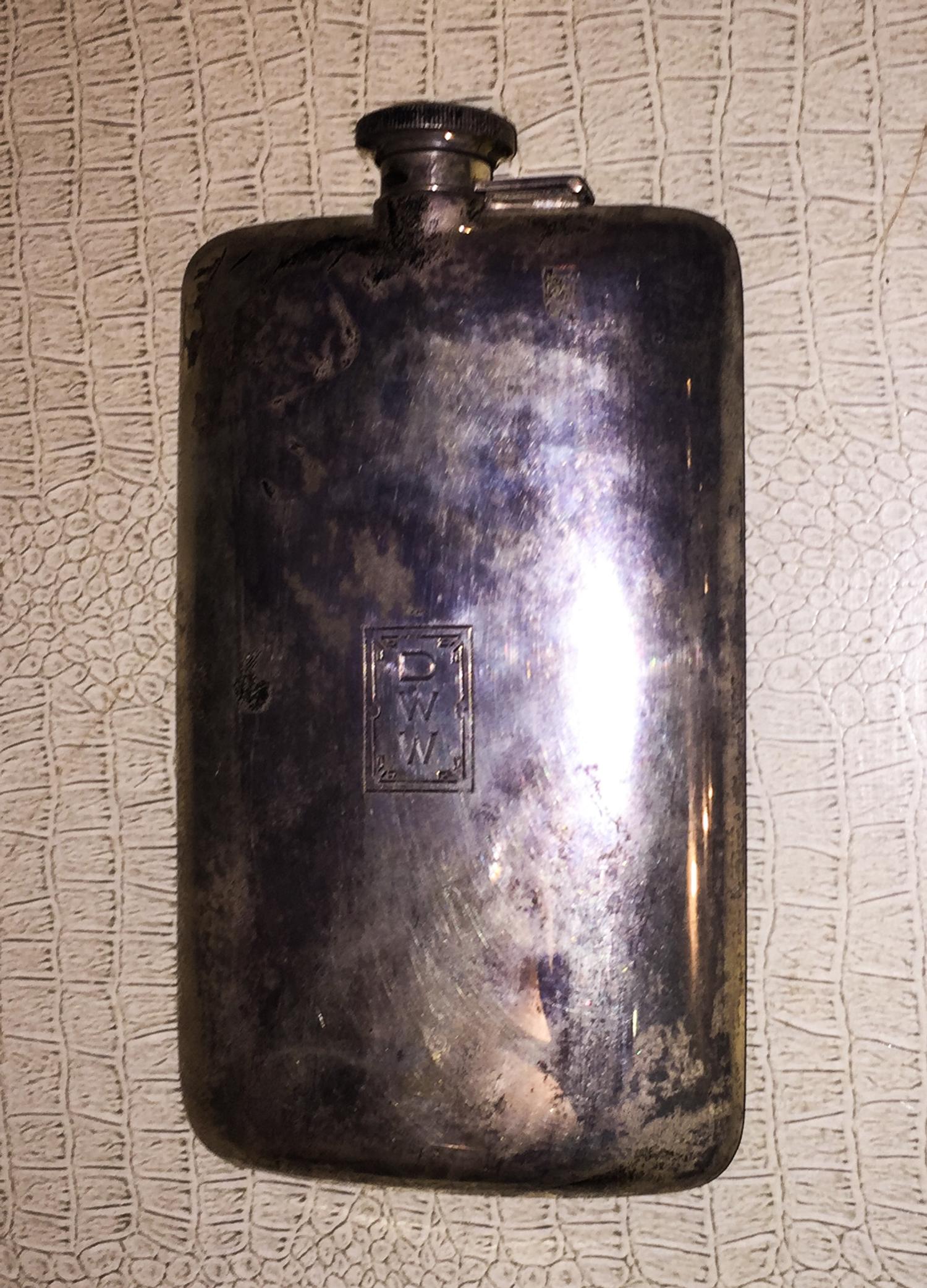 An American Silver Hip Flask, possibly James E. Blake Co., Attleboro, MA, with engraved monogram DWW.