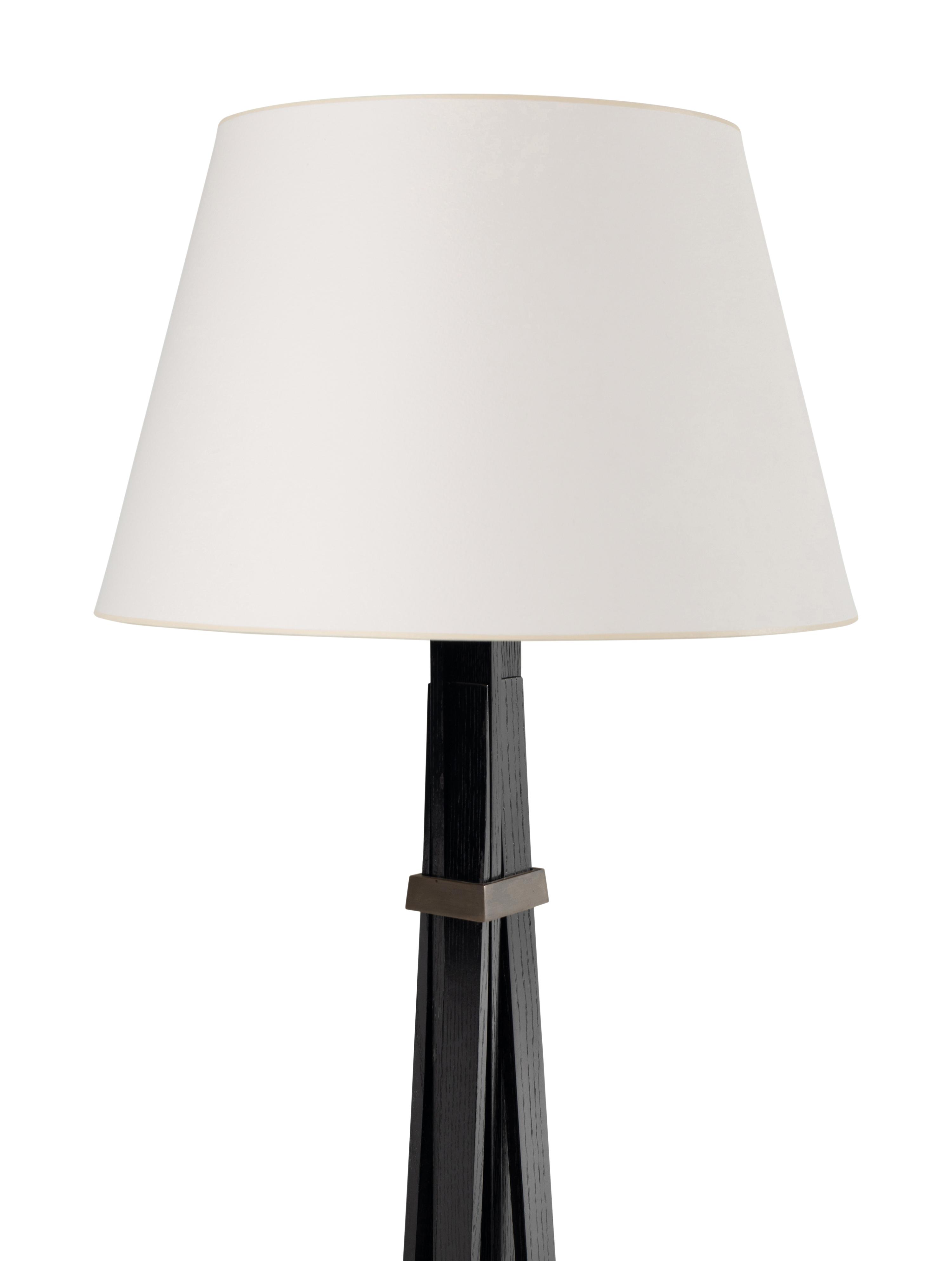 A Contemporary Ebonized Oak Floor Lamp