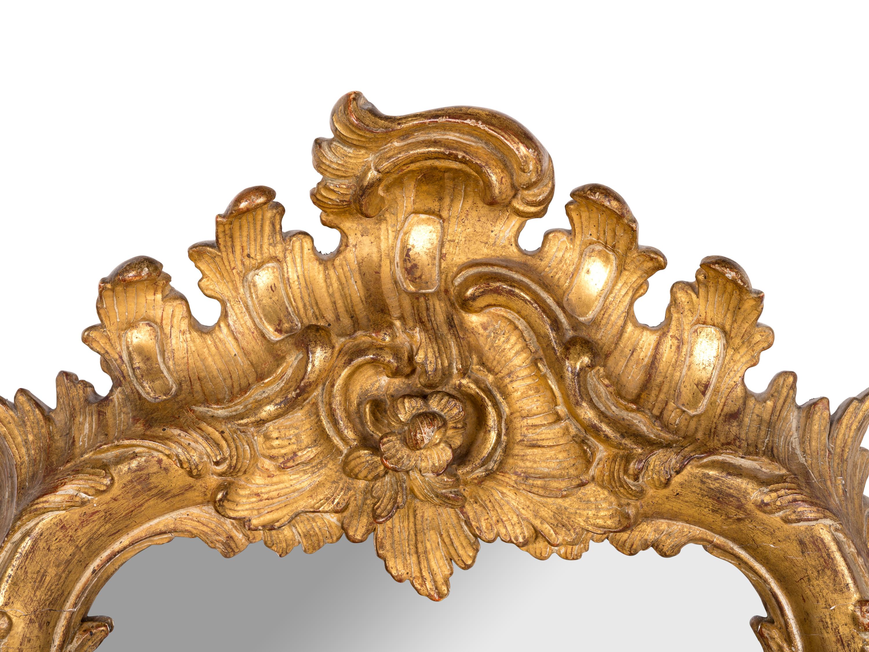 A Pair of Italian Baroque Style Giltwood Mirrors