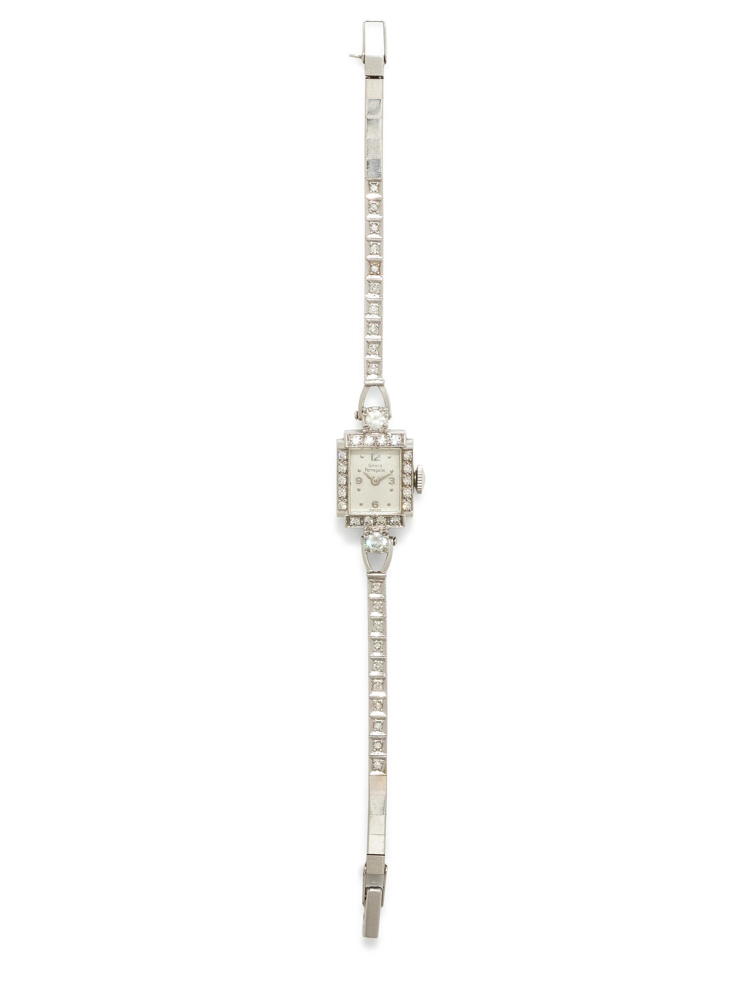 GIRARD-PERREGAUX, PLATINUM AND DIAMOND WRISTWATCH