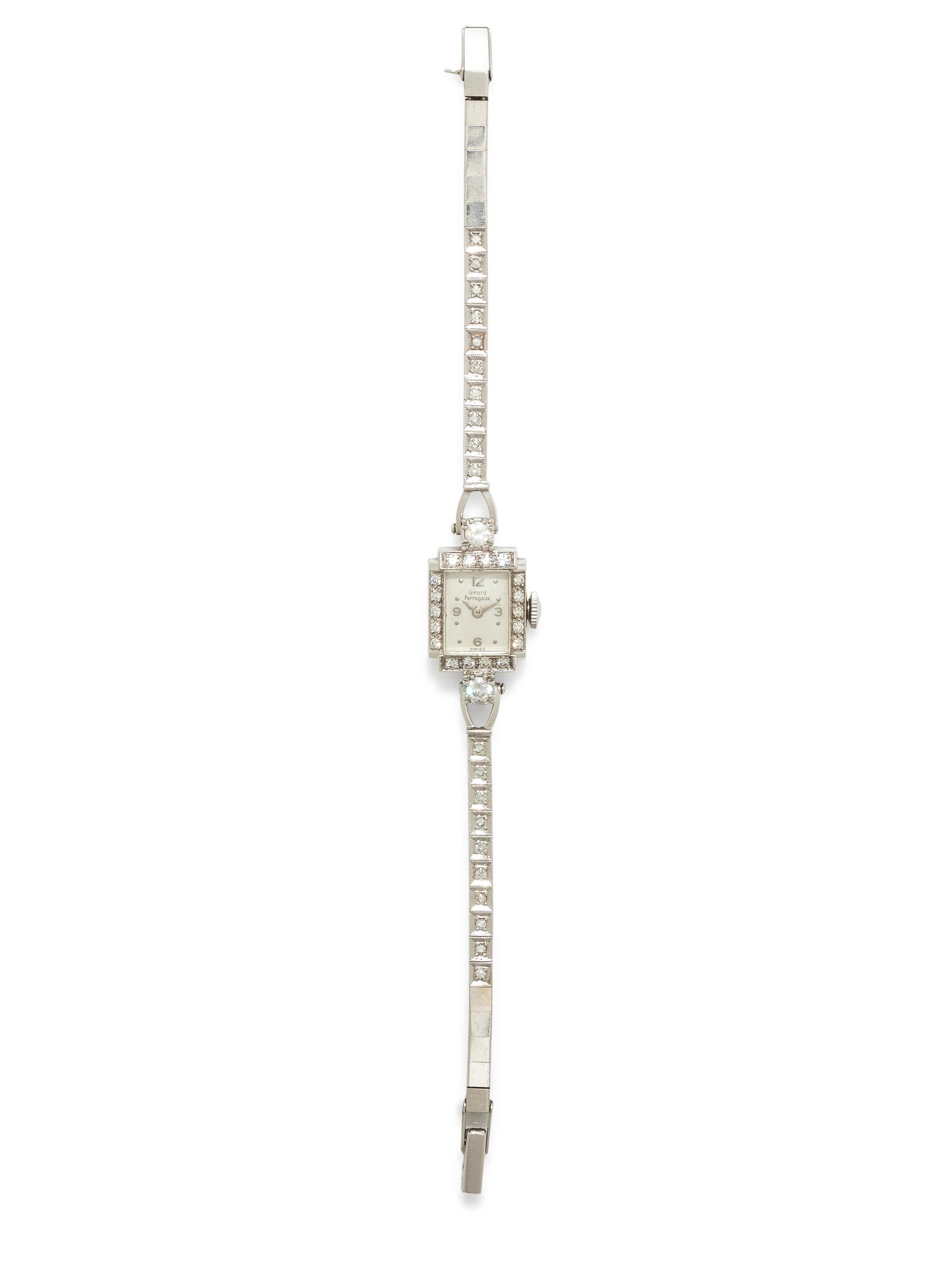 GIRARD-PERREGAUX, PLATINUM AND DIAMOND WRISTWATCH