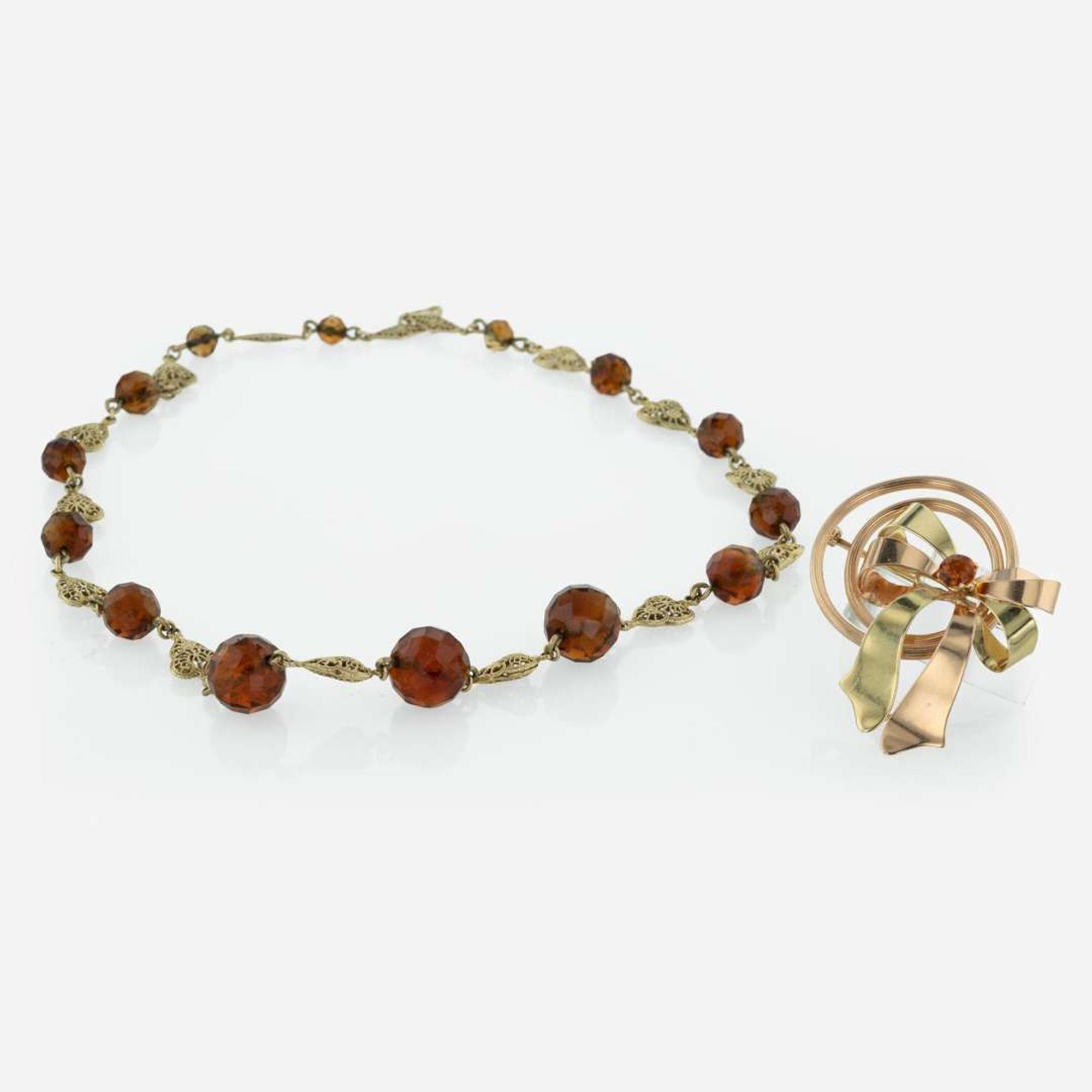 A Garnet Pendant and Citrine Necklace