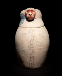 A Set of Four Egyptian Painted Limestone Canopic Jars of the Sons of Horus