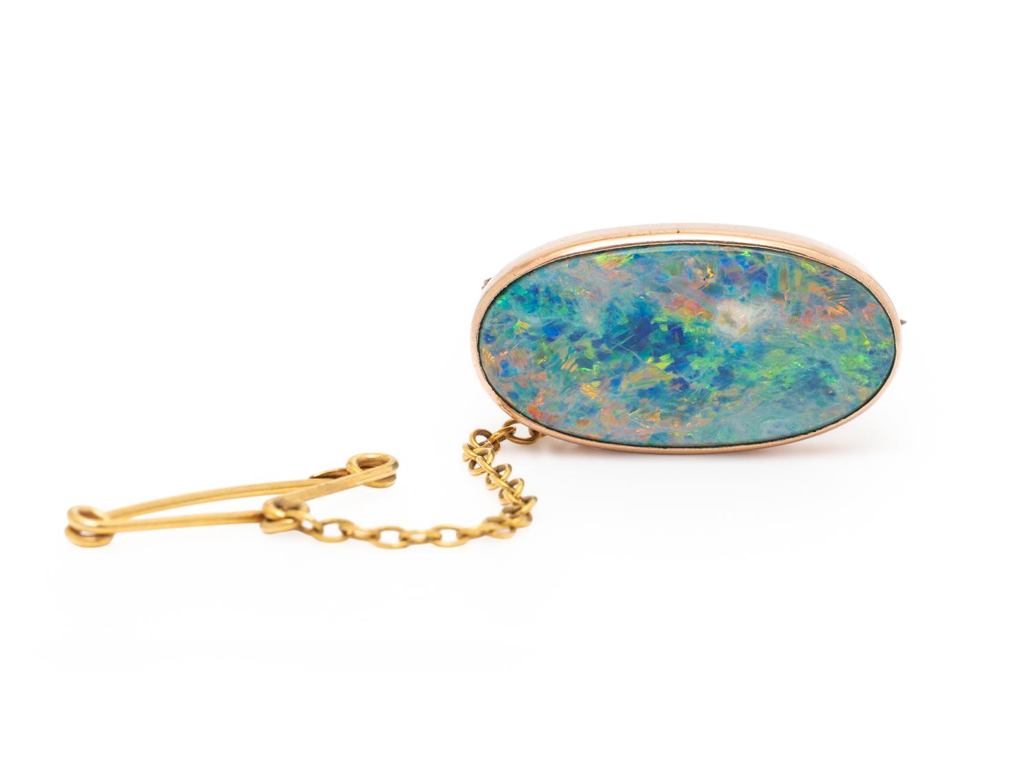 BLACK OPAL AND GOLD BROOCH