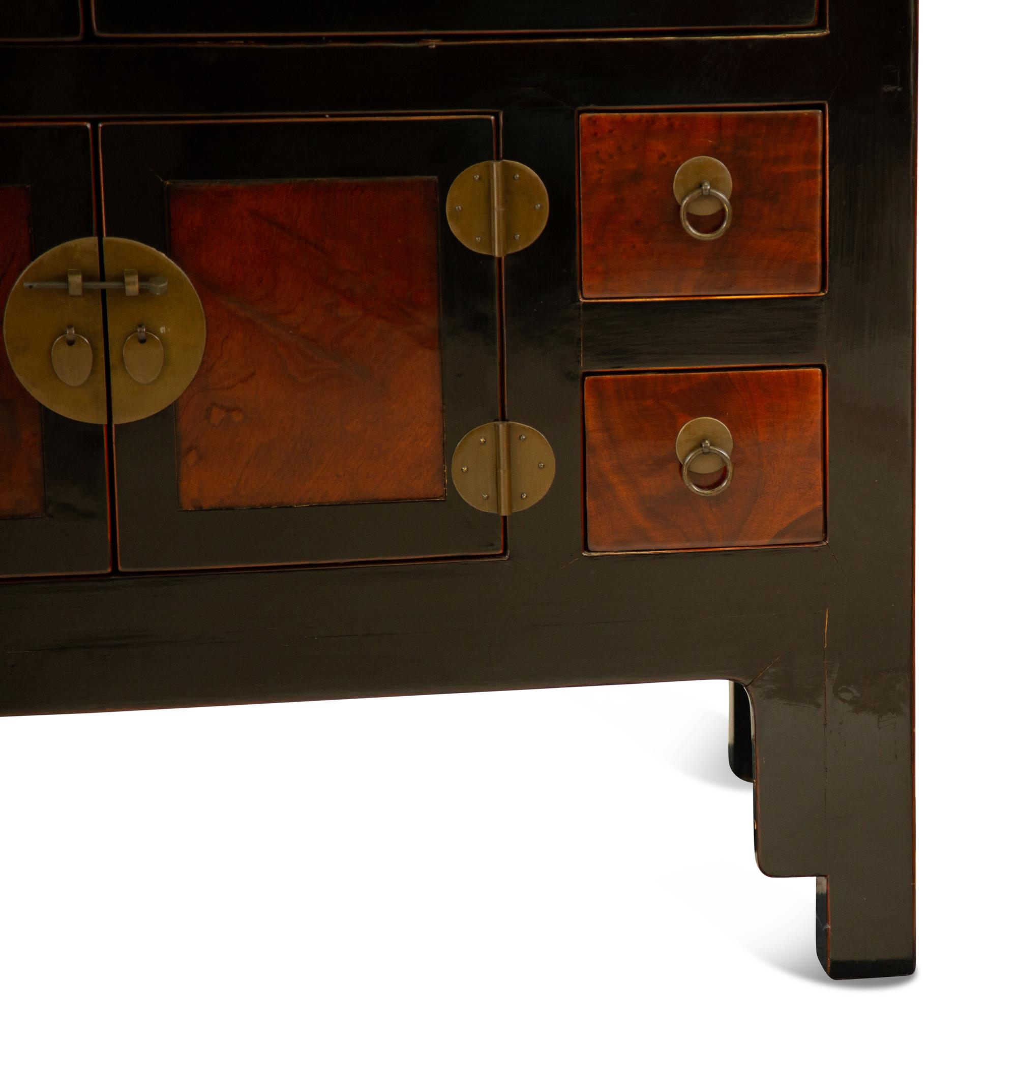 A Chinese Ming Style Black Lacquer and Elm Wood Cabinet