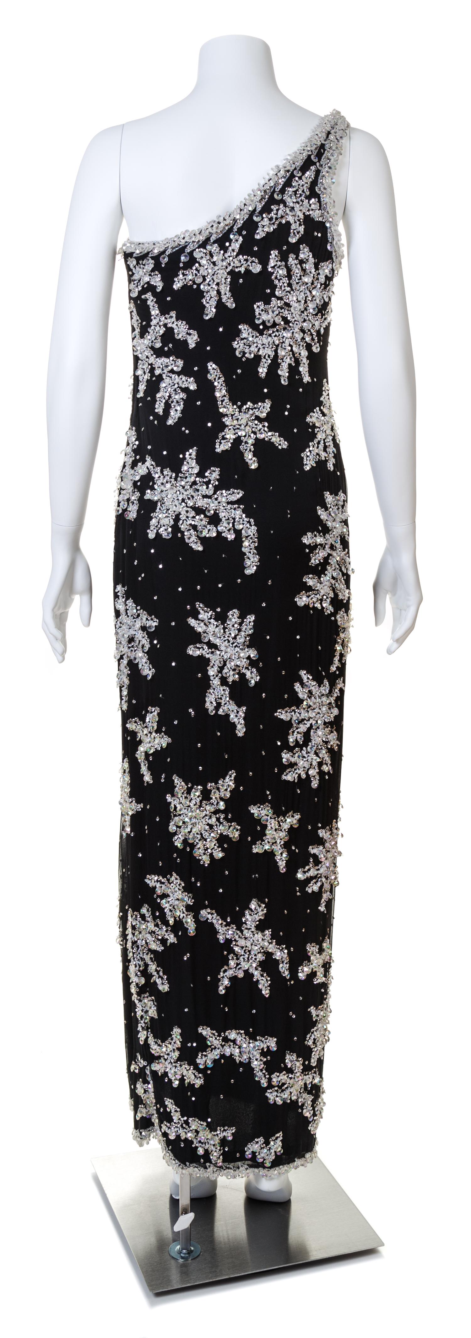 An Adolfo 1970s Black Chiffon One Shoulder Gown,