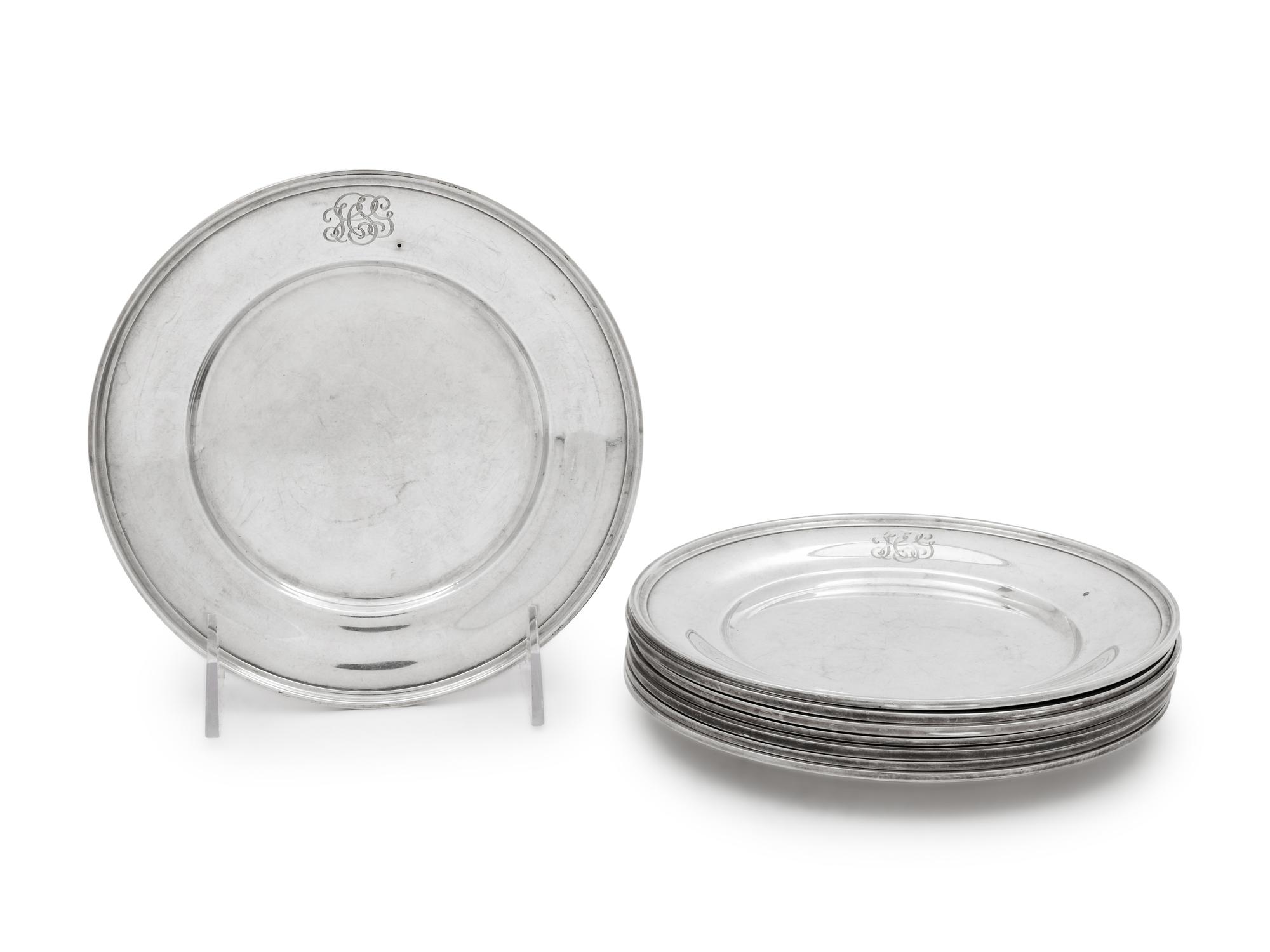 A Set of Eight American Silver Bread Plates