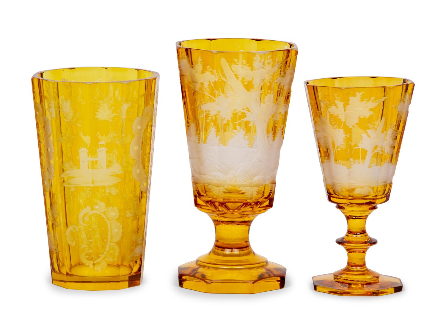 A Bohemian Amber Etched Glass Table Service