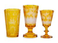 A Bohemian Amber Etched Glass Table Service