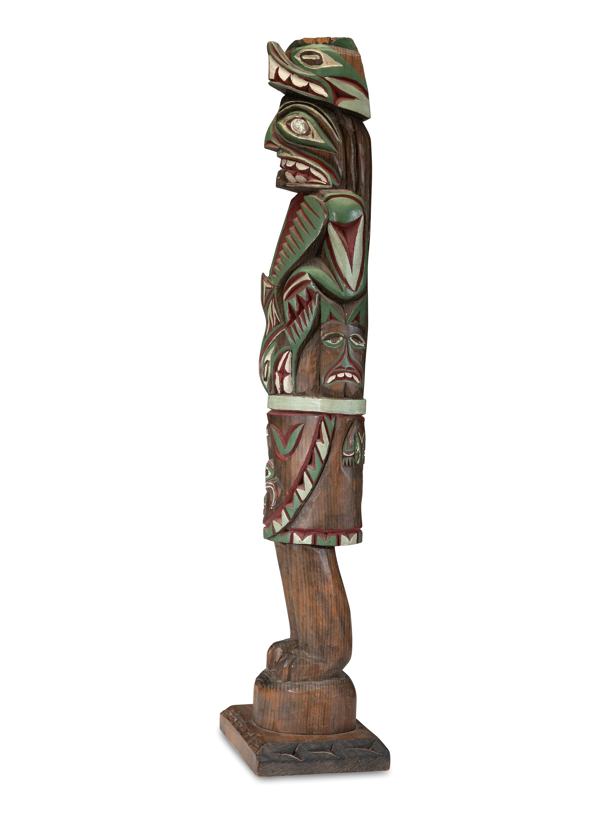 A Carved Totemic Figure, In the Northwest Coast Style