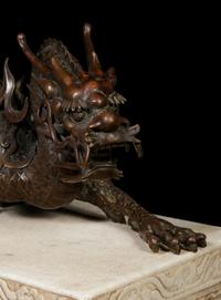 A Large Chinese Bronze Dragon and Stone Base