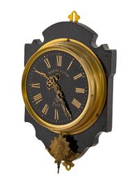 A French Gilt Metal Mounted Ebonized Wall Clock