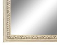 A Louis XVI Style Painted and Part-Silvered Boiserie Mirror