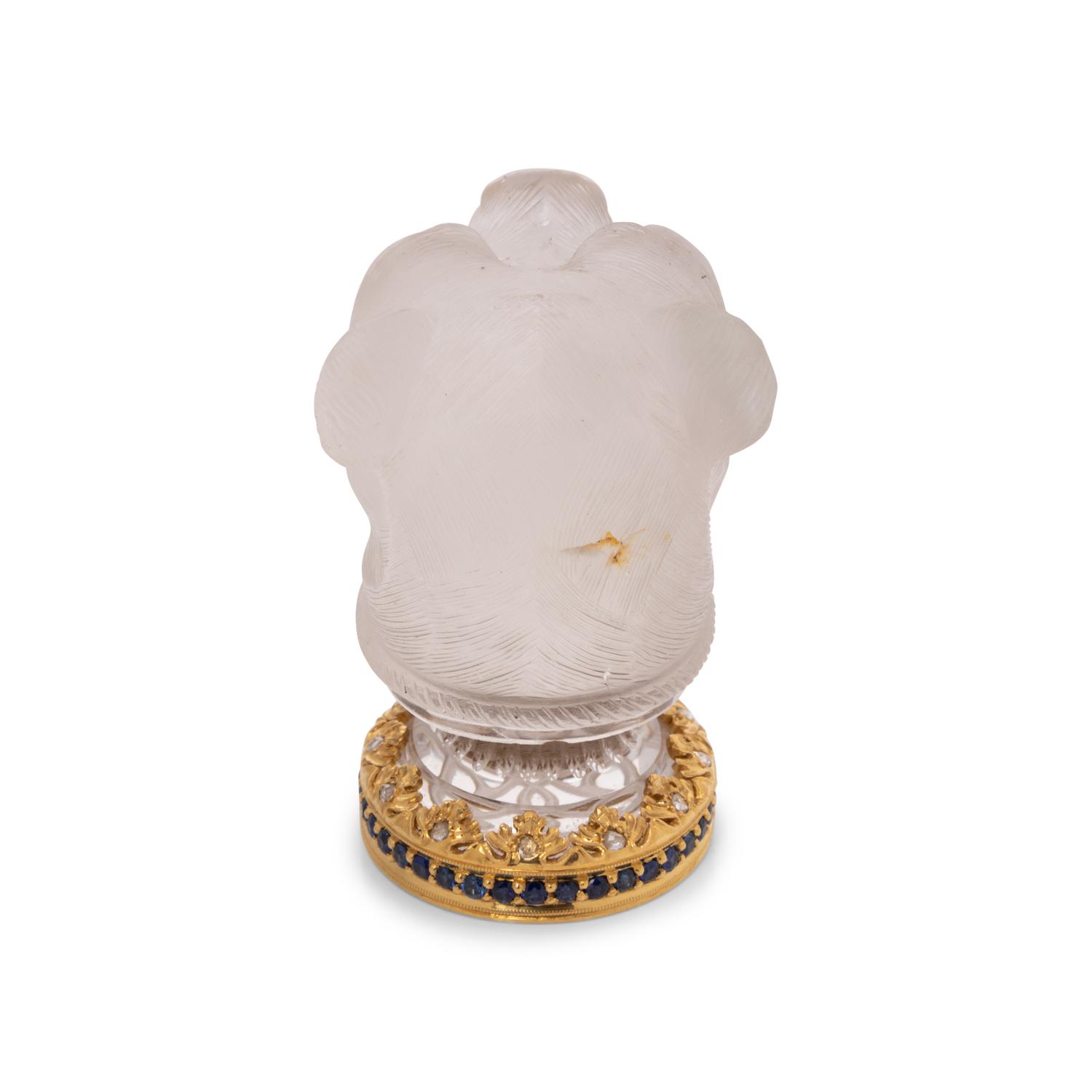 A Continental Gold, Diamond and Sapphire Mounted Carved Rock Crystal Hand-Seal