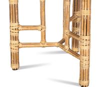 A Set of Four McGuire Rattan Target Armchairs and an Organic Bamboo Table