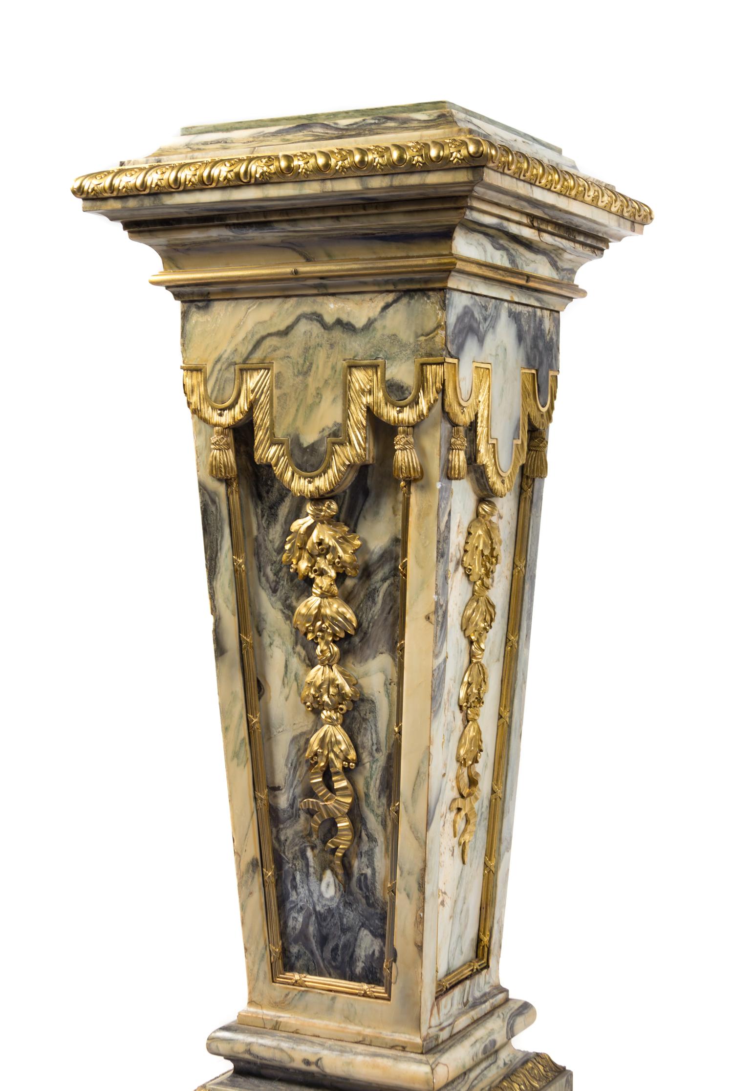 A Pair of Continental Gilt Bronze Mounted Marble Pedestals Height 44 1/2 x width 17 1/2 x depth 17 1/2 inches. — 19TH CENTURY