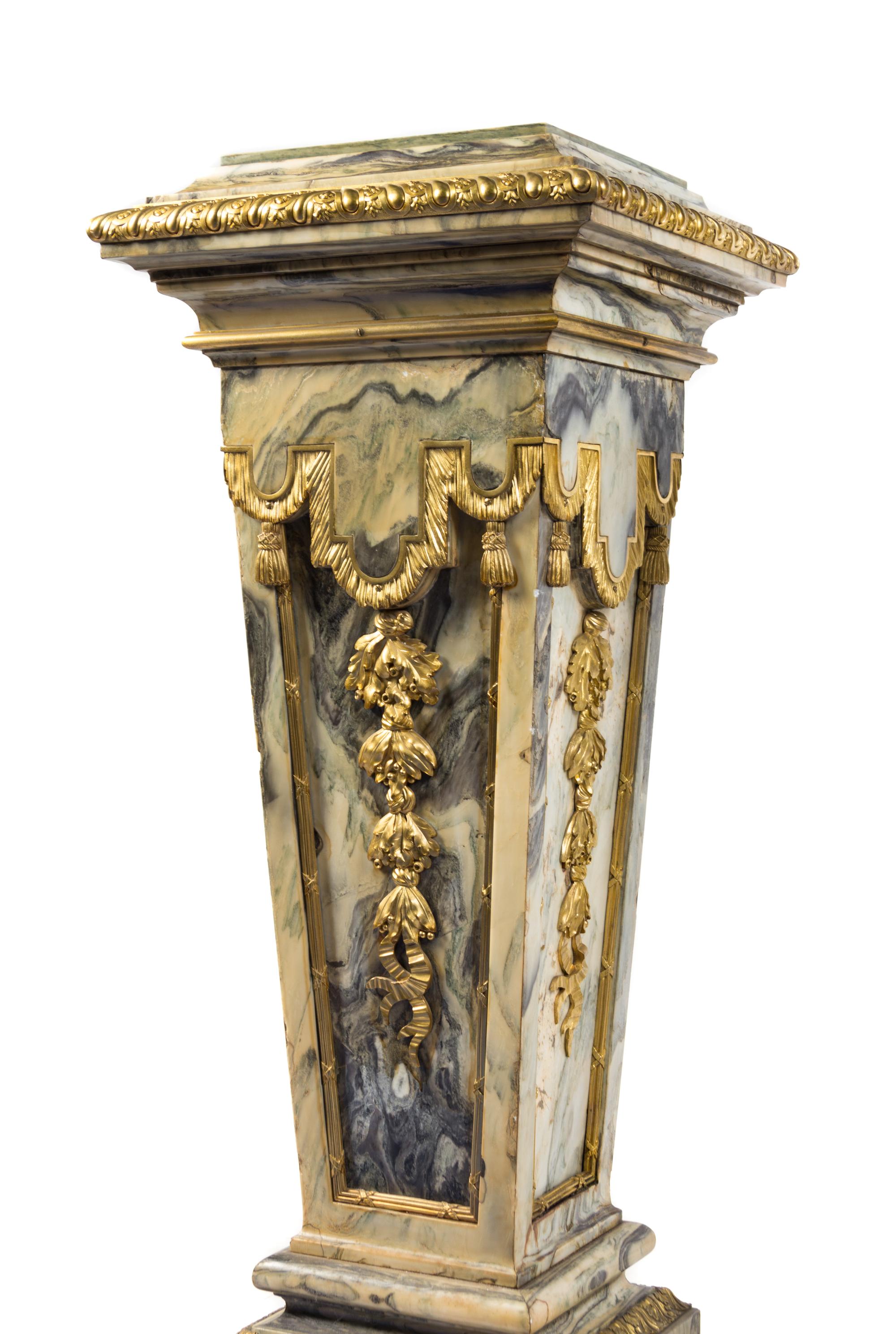 A Pair of Continental Gilt Bronze Mounted Marble Pedestals Height 44 1/2 x width 17 1/2 x depth 17 1/2 inches. — 19TH CENTURY