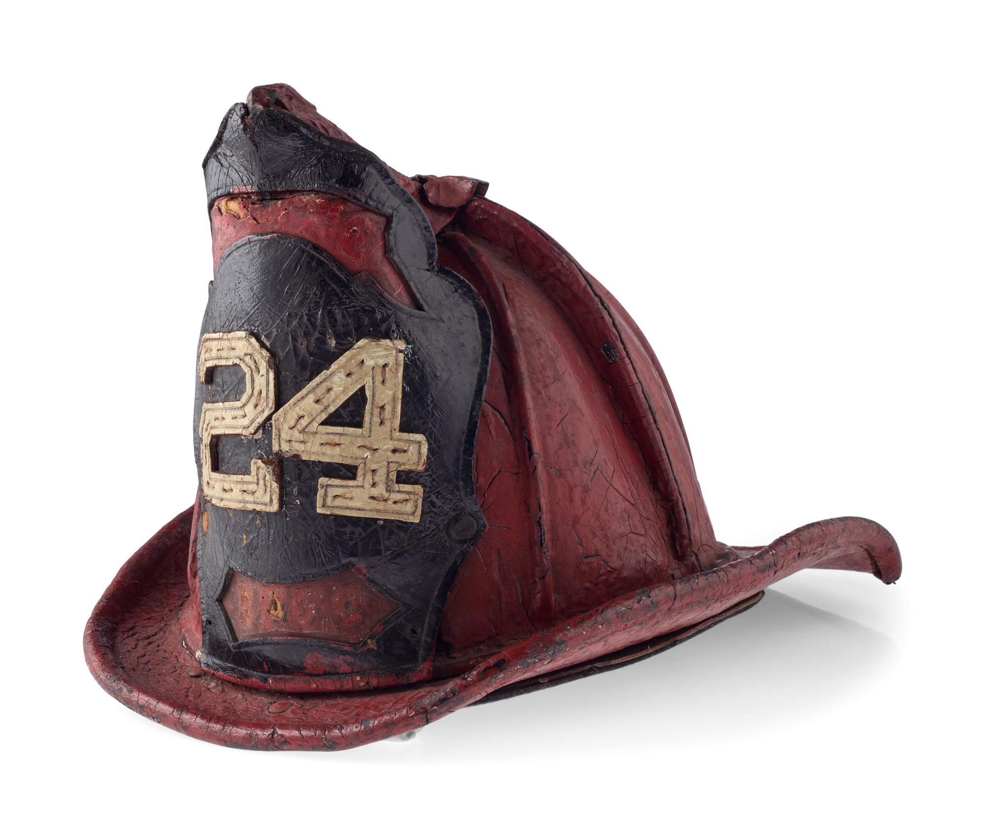 [CALIFORNIA] -- [FIREFIGHTING]. Fire helmet, badges, photographs, and more associated with San Francisco firefighter Ernest Nelson, Engine Co. No. 42, ca 1910-1930s.
