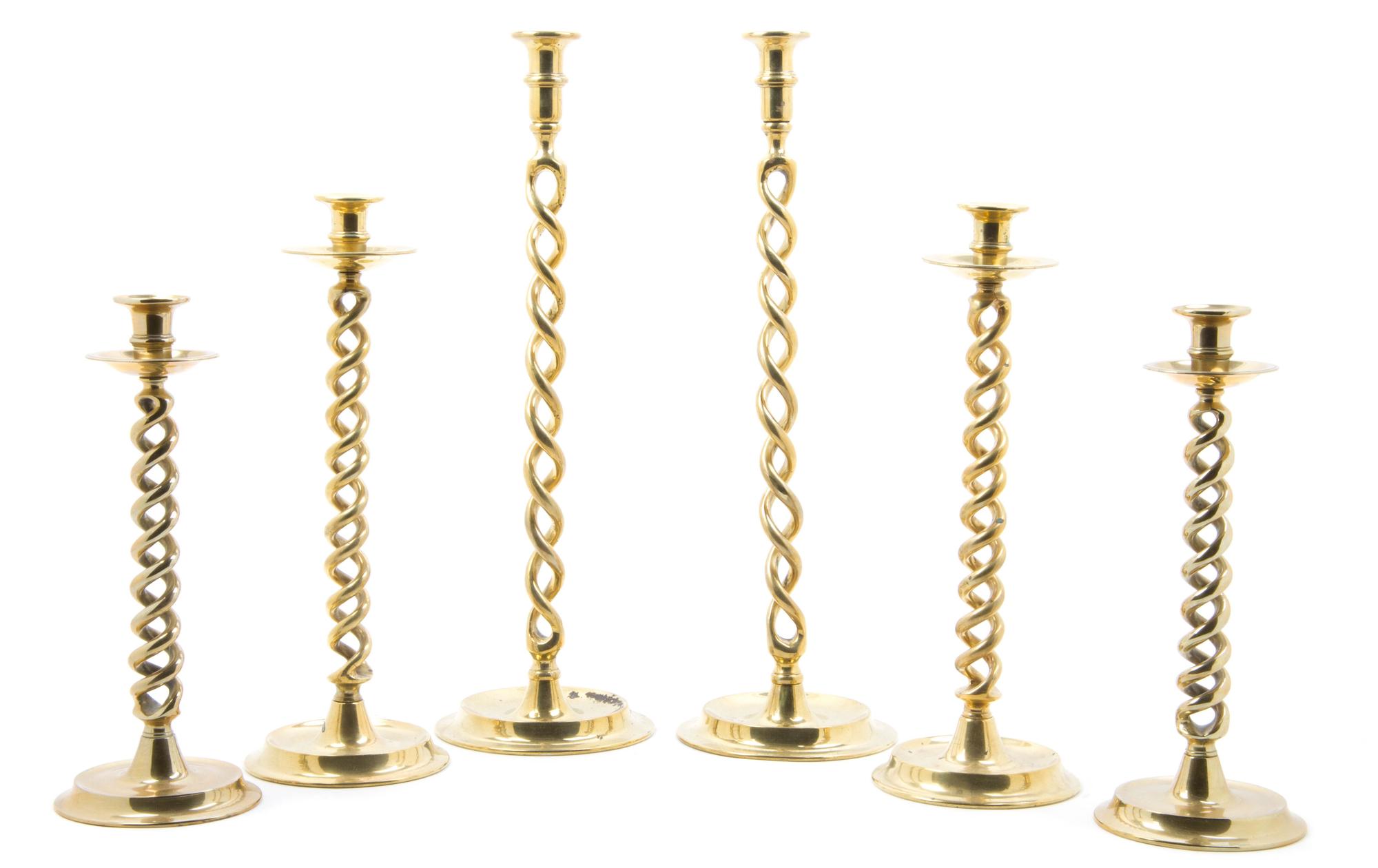 Three Pairs of English Brass Barley Twist Candlesticks, Height of tallest 20 1/8 inches.
