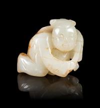 A White and Russet Jade Figure of a Boy Height 1 1/4 inches. — 19TH CENTURY
