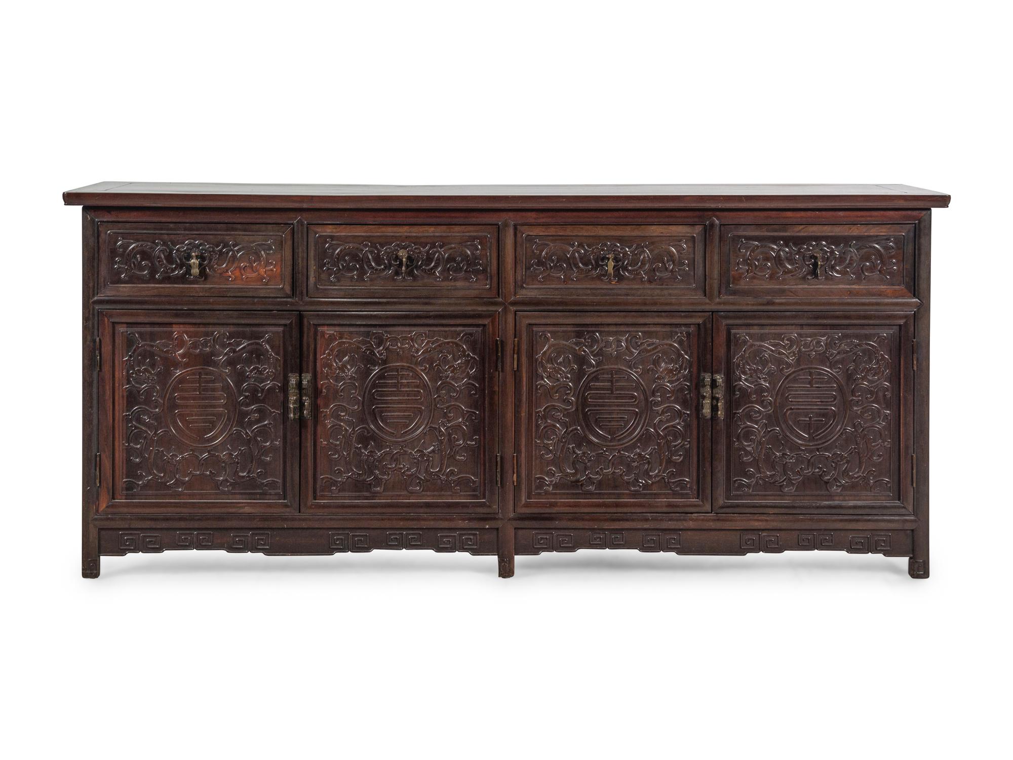 A Chinese Export Carved Hardwood Console Cabinet