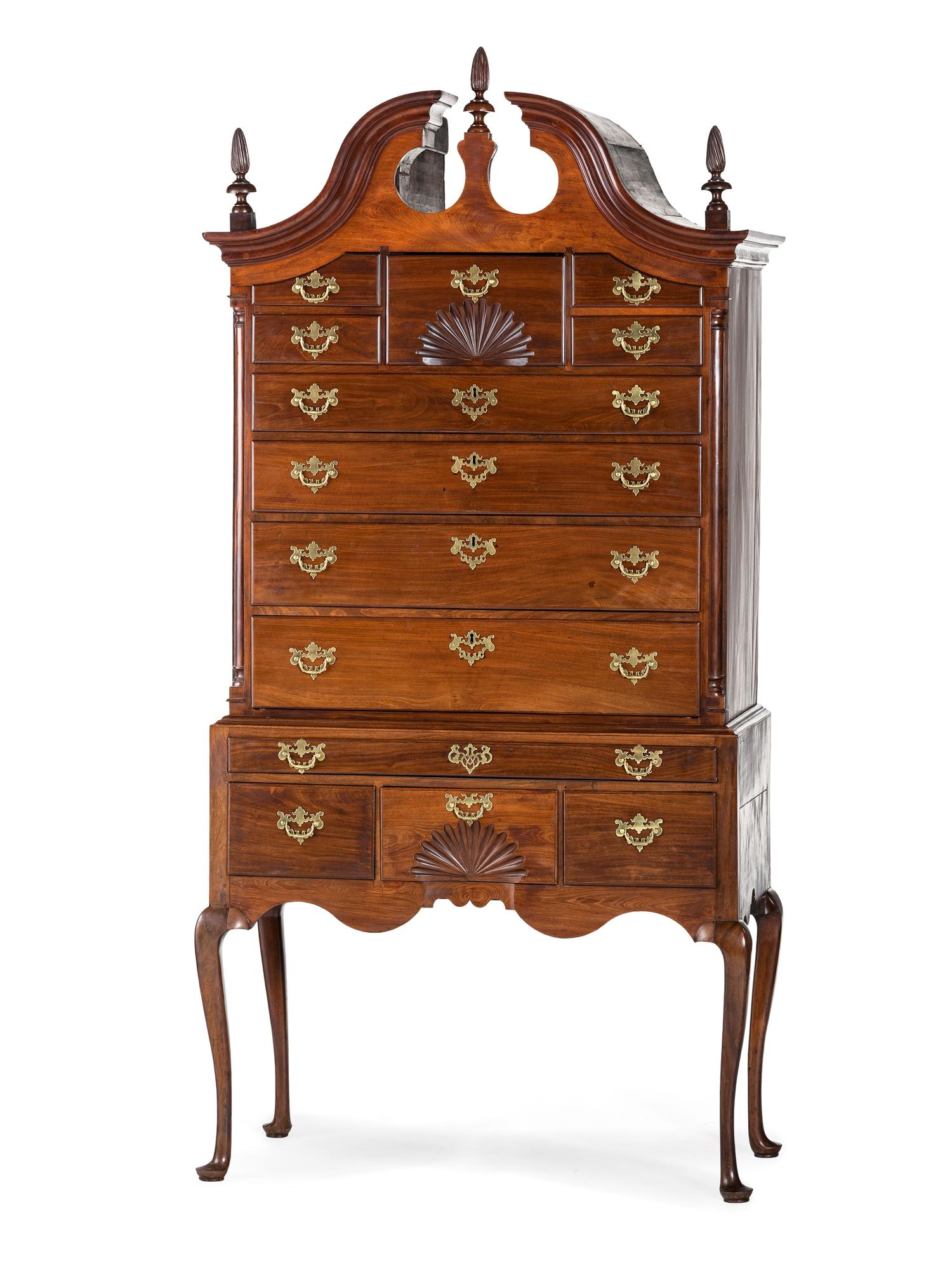 A Queen Anne Carved Mahogany Bonnet-Top High Chest of Drawers