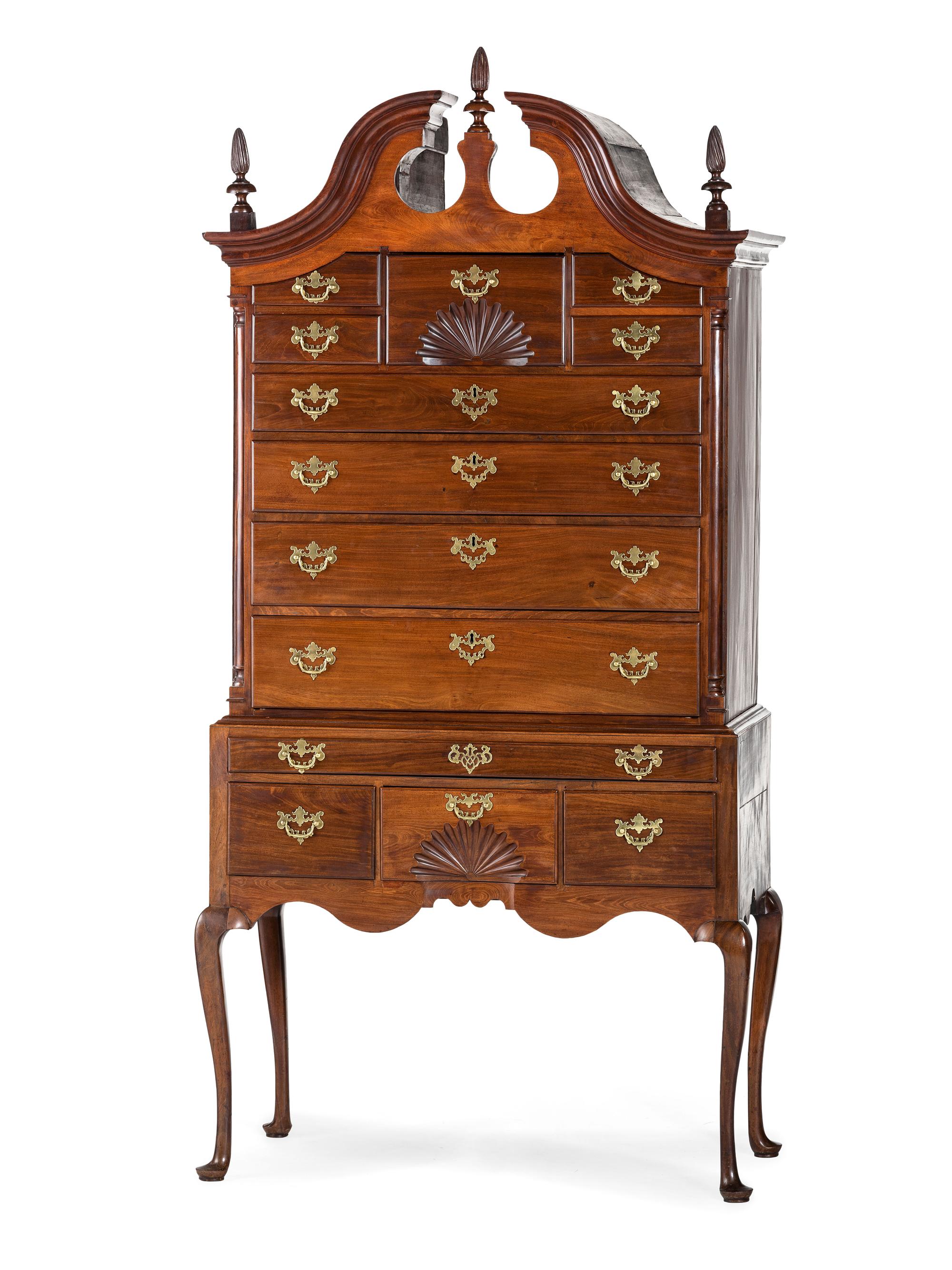 A Queen Anne Carved Mahogany Bonnet-Top High Chest of Drawers
