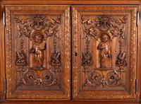 A Renaissance Revival Carved Walnut Cabinet In the Manner of Alexander Roux