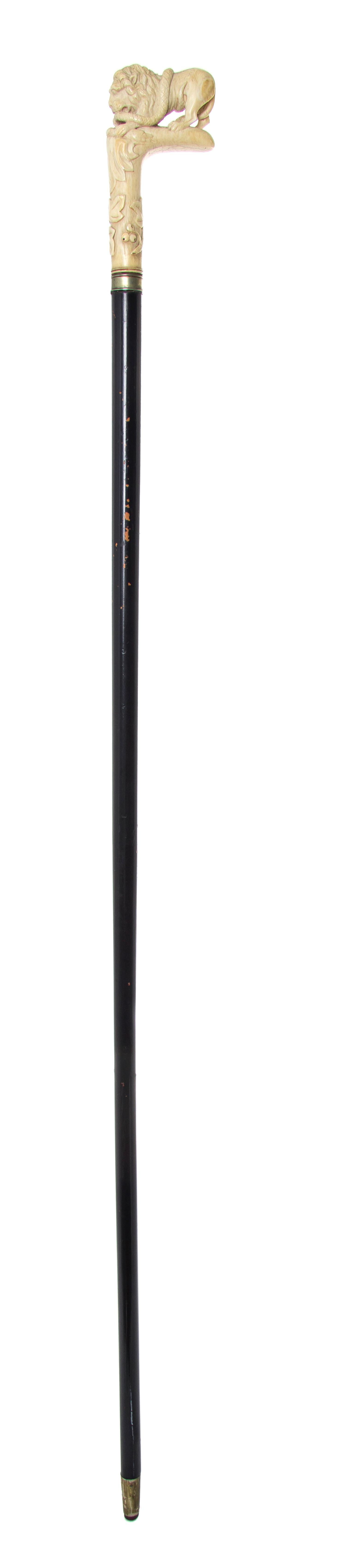 A Continental Ivory Handled Cane, Length of handle 4 1/4 x length overall 34 1/8 inches.