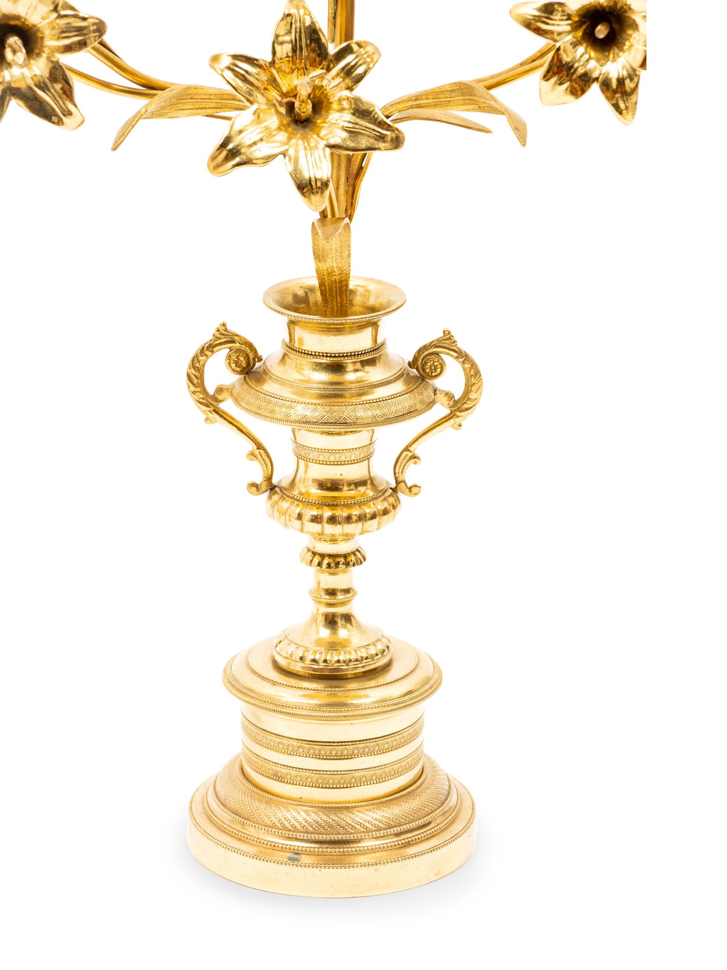A Pair of Gilt Metal Three Light Candelabras