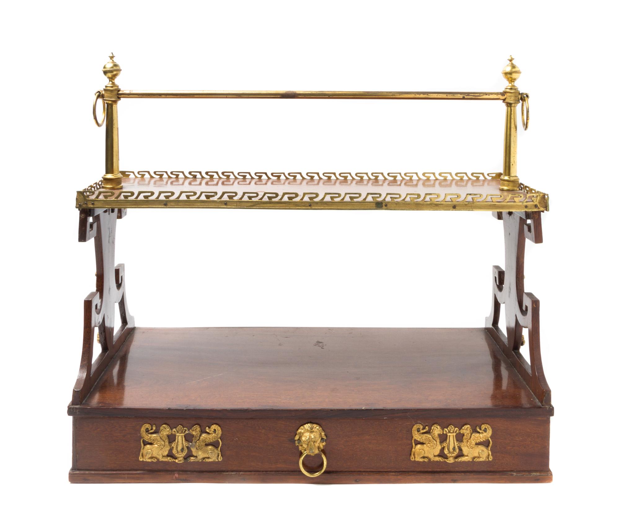 An Empire Style Gilt Metal Mounted Rack Width 19 inches.