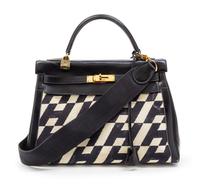 A Rare Hermes 35cm Ulysses Black Leather and Ivory Canvas Kelly Bag, 13 x 9 x 5 inches.