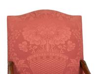 A Pair of Regence Style Carved Beechwood Fauteuils
