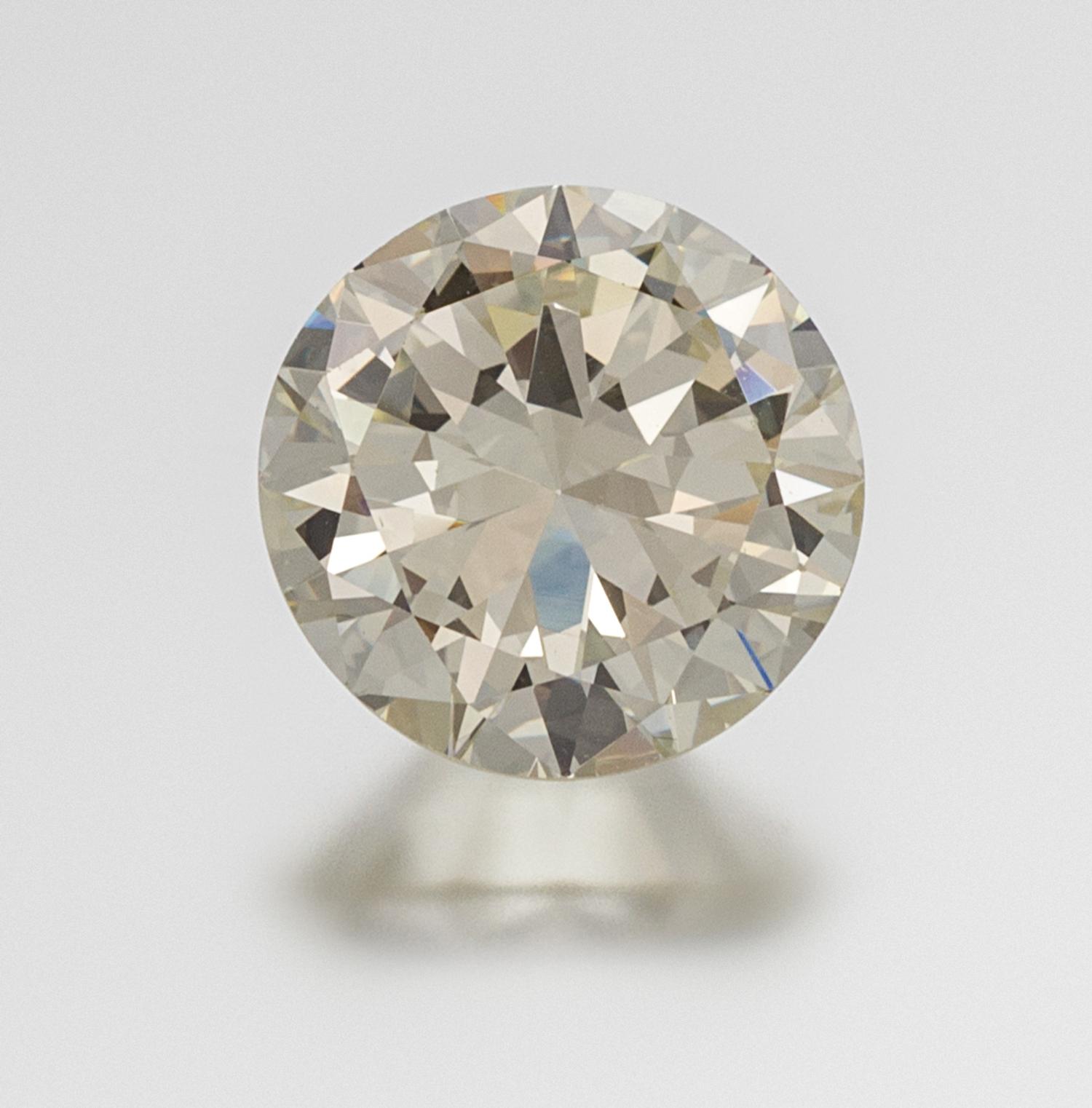 An 11.90 Carat Round Brilliant Cut Diamond, 6.60 dwts.