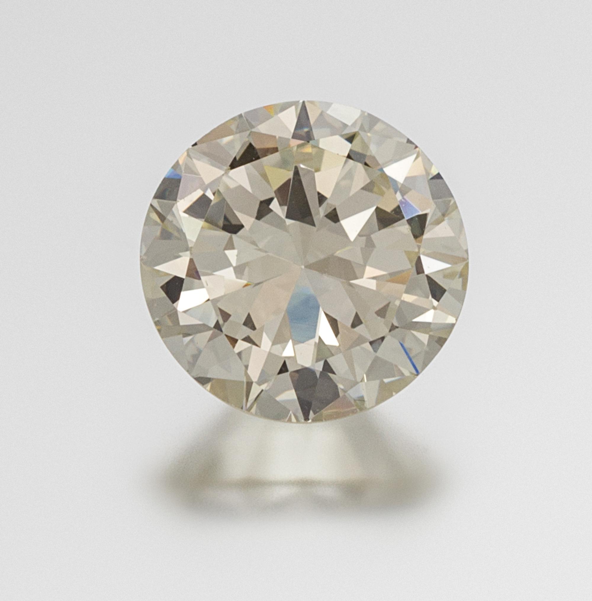 An 11.90 Carat Round Brilliant Cut Diamond, 6.60 dwts.
