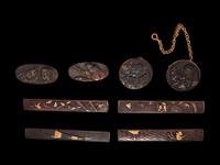 Eight Japanese Mixed-Metal Sword Fittings and Netsuke