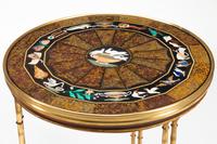 A Pair of Gilt Bronze and Pietra Dura Tables in the Manner of Adam Weisweiler