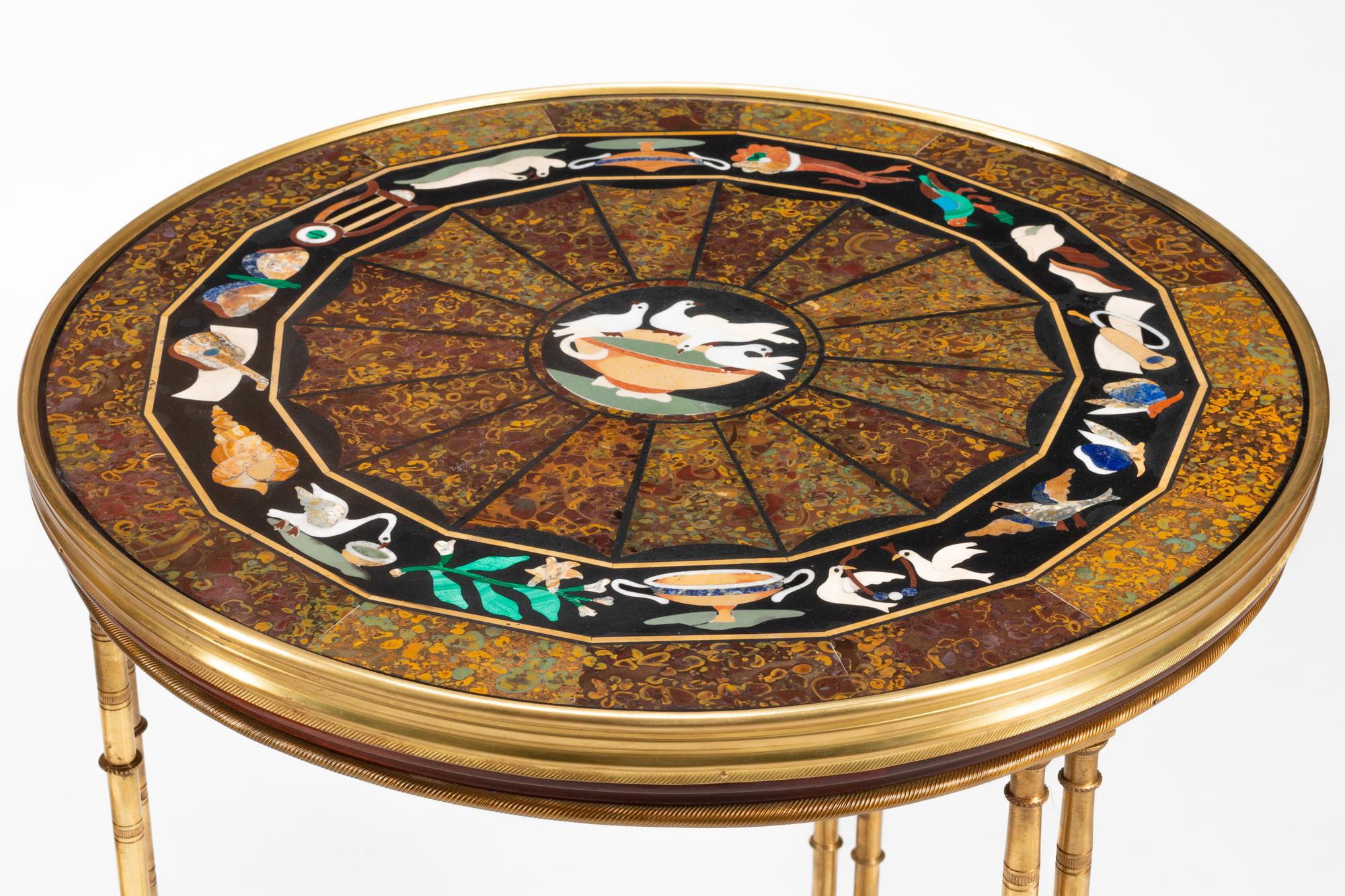 A Pair of Gilt Bronze and Pietra Dura Tables in the Manner of Adam Weisweiler