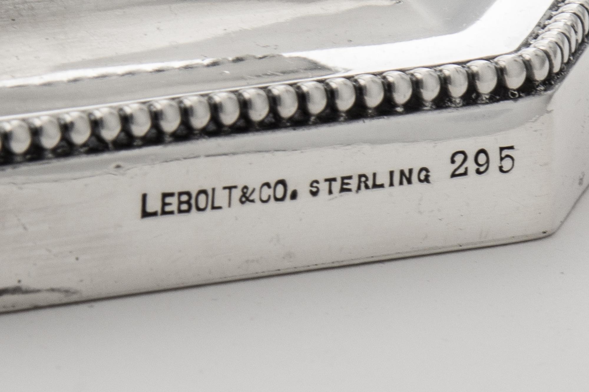 Three American Silver Candlesticks, Lebolt & Co., Chicago, IL, 20th Century, each of paneled baluster form with beaded rims and a weigh
