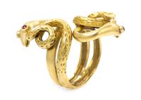 An 18 Karat Yellow Gold and Ruby Serpent Ring, 9.70 dwts.